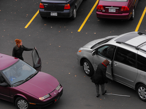People exiting vehicles after an accident